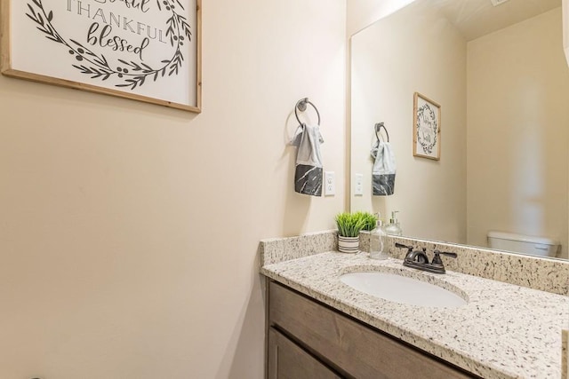 171 Osier Dr, Mcdonough, GA 30252 - bathroom with vanity and toilet