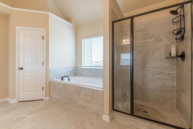 171 Osier Dr, Mcdonough, GA 30252 - full bath featuring a bath, a stall shower, and vaulted ceiling