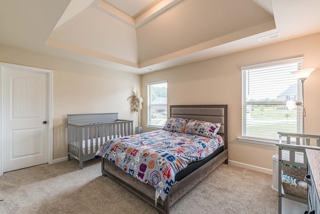 171 Osier Dr, Mcdonough, GA 30252 - bedroom featuring carpet floors, baseboards, and a raised ceiling