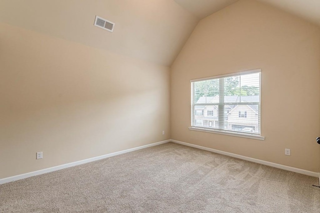 171 Osier Dr, Mcdonough, GA 30252 - unfurnished room with vaulted ceiling, light carpet, and baseboards