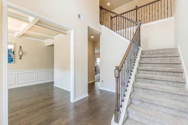 171 Osier Dr, Mcdonough, GA 30252 - staircase featuring wood finished floors, beam ceiling, crown molding, coffered ceiling, and baseboards