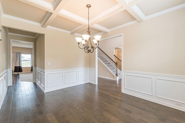 171 Osier Dr, Mcdonough, GA 30252 - empty room with coffered ceiling, a chandelier, dark wood-type flooring, beam ceiling, and stairway