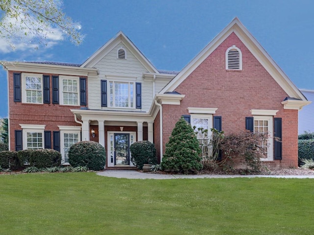 view of front of home with a front yard