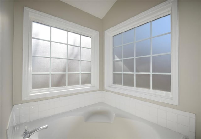 bathroom featuring a garden tub