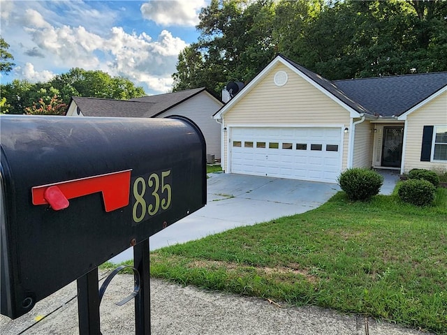 835 Amelia Grove Ln, Lawrenceville, GA 30045 - details featuring a downspout and driveway