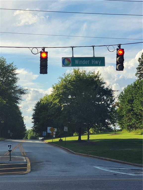 835 Amelia Grove Ln, Lawrenceville, GA 30045 - view of road featuring curbs, traffic signs, and traffic lights
