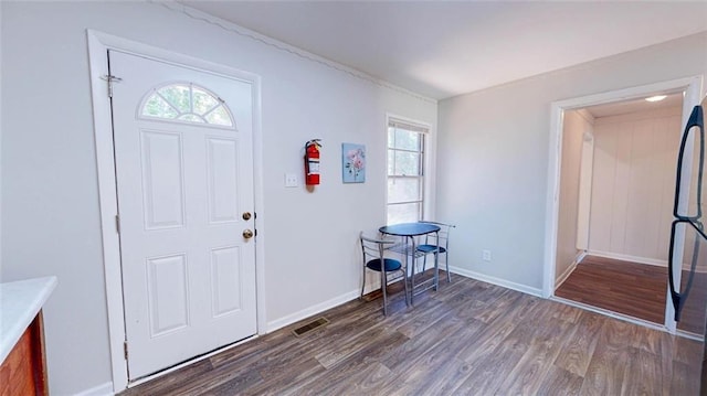 foyer featuring dark hardwood / wood-style flooring