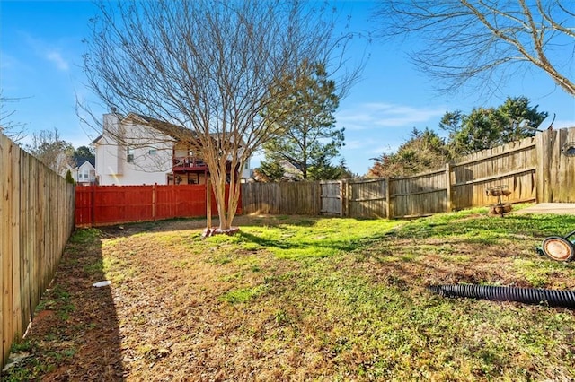 view of yard featuring a fenced backyard