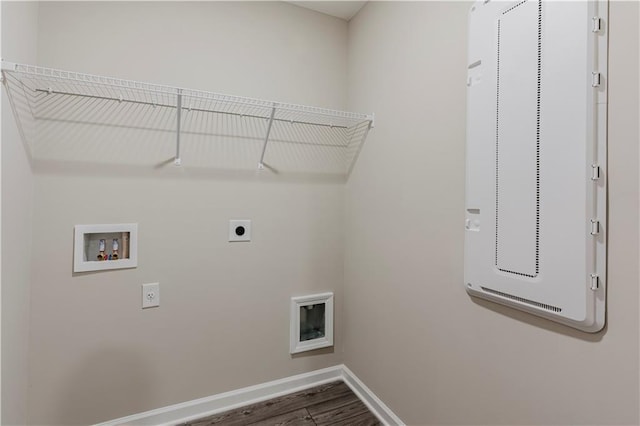laundry room with hookup for an electric dryer, baseboards, wood finished floors, and hookup for a washing machine