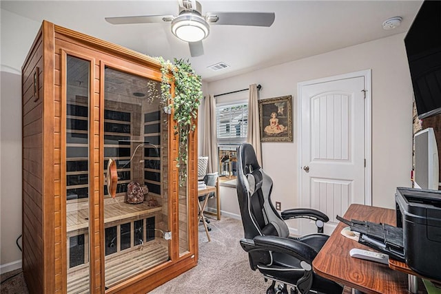 office featuring carpet floors and ceiling fan