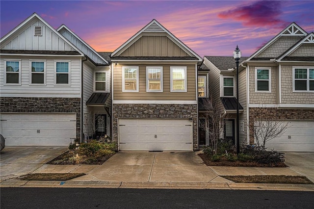 view of front of property with a garage