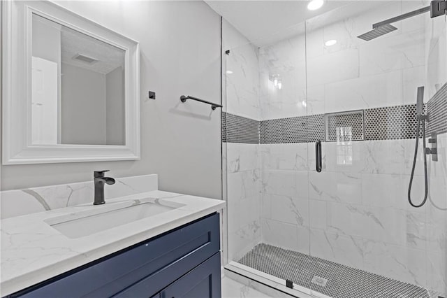 2599 Willow Creek Dr, Duluth, GA 30096 - bathroom featuring vanity, a stall shower, and marble finish floors