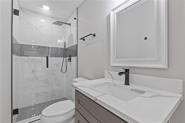 2599 Willow Creek Dr, Duluth, GA 30096 - full bath featuring vanity, toilet, and a marble finish shower