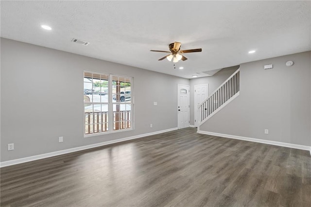 2599 Willow Creek Dr, Duluth, GA 30096 - unfurnished living room with a ceiling fan, dark wood finished floors, baseboards, stairway, and recessed lighting