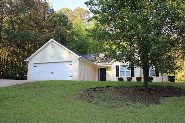 single story home featuring a front yard, driveway, and a garage