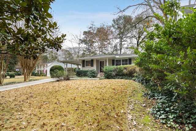 single story home featuring a carport