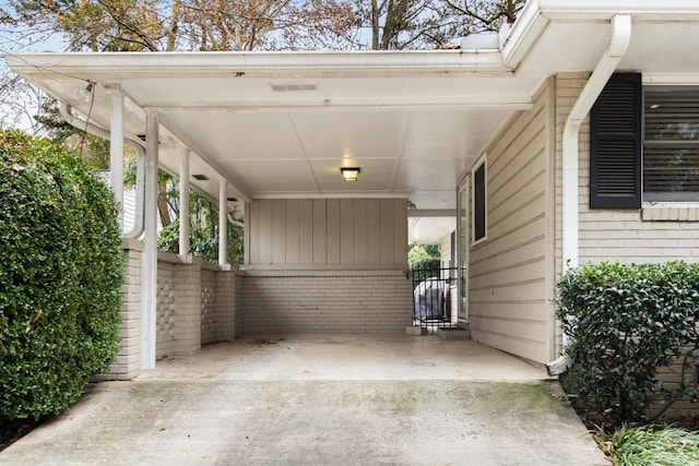 view of parking / parking lot with a carport