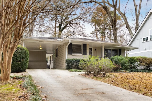 view of front of property with a carport