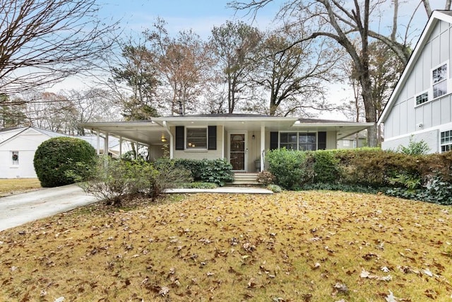 view of front facade with a carport