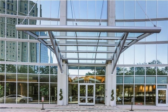 property entrance featuring french doors