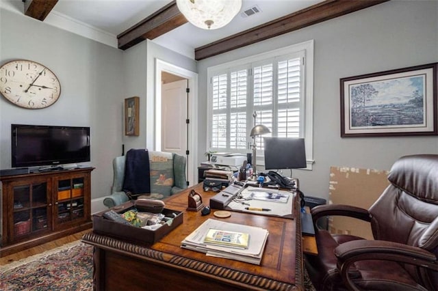 office space with beam ceiling and wood finished floors