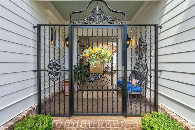 doorway to property with a gate
