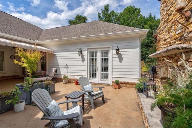 view of patio featuring french doors