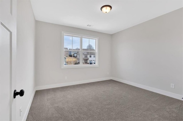 unfurnished room featuring carpet floors