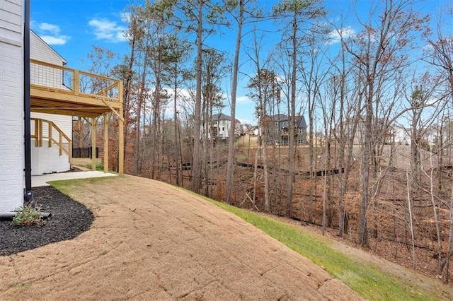 view of yard featuring a deck