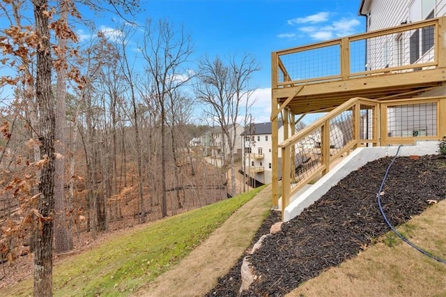 view of yard featuring a deck