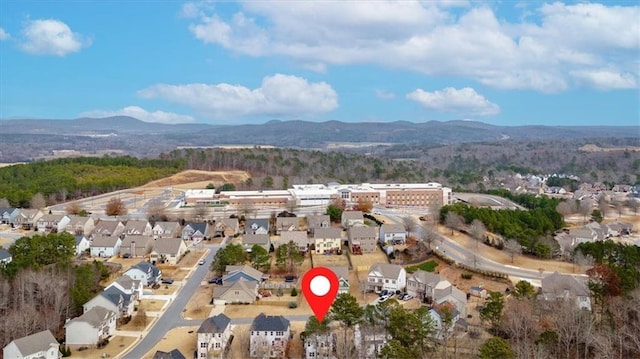 bird's eye view with a mountain view