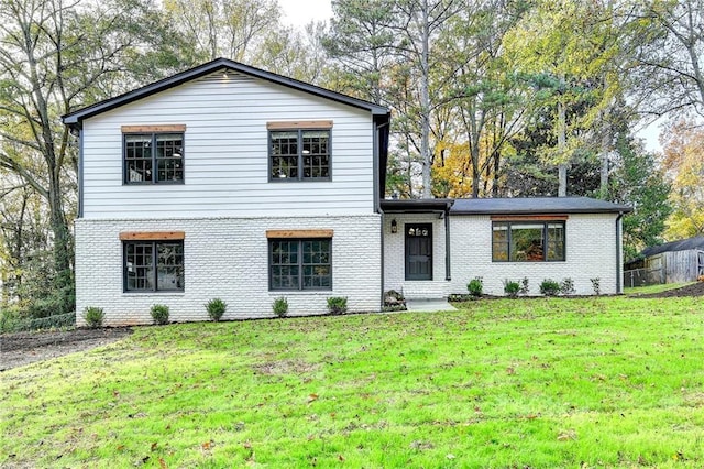 front facade featuring a front lawn