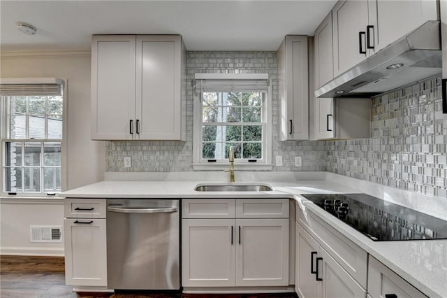 kitchen with dishwasher, sink, black electric stovetop, ornamental molding, and decorative backsplash