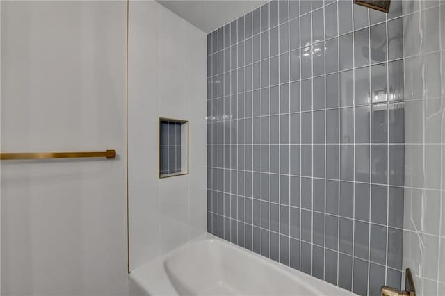 bathroom with shower / tub combination