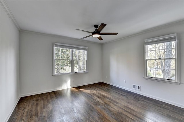 spare room featuring crown molding, ceiling fan, and dark hardwood / wood-style flooring