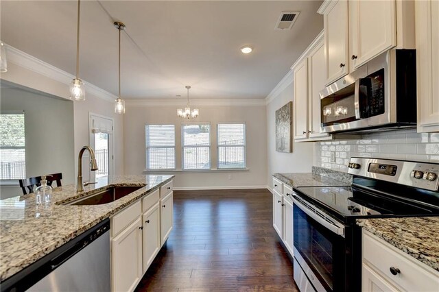 unfurnished dining area with crown molding, a chandelier, and dark hardwood / wood-style flooring