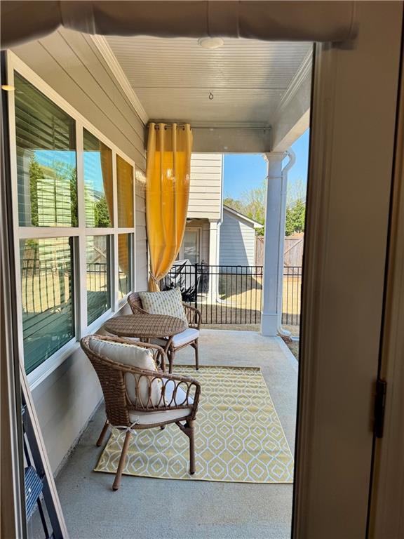 rear view of property with a patio area and a lawn