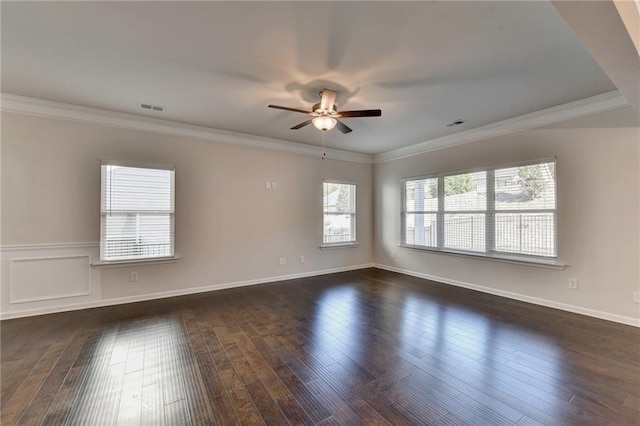 unfurnished room with ceiling fan, ornamental molding, and dark hardwood / wood-style floors