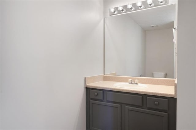 139 Palmetto St, Locust Grove, GA 30248 - bathroom featuring vanity and toilet