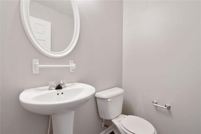 139 Palmetto St, Locust Grove, GA 30248 - bathroom featuring toilet