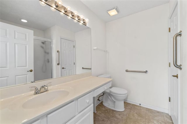 full bath with visible vents, baseboards, tile patterned floors, vanity, and a shower stall