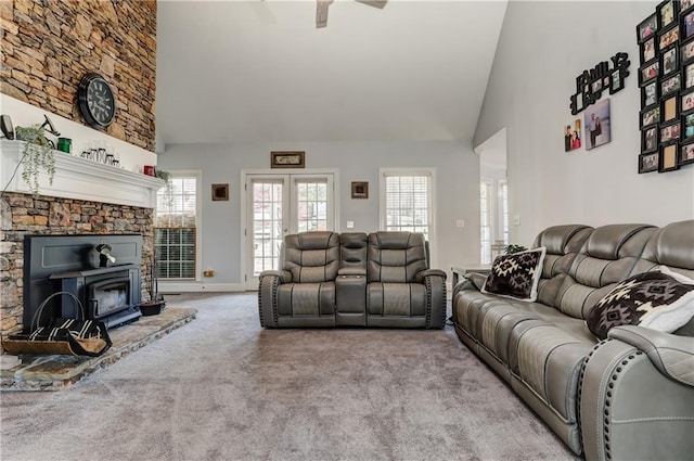 living room featuring high vaulted ceiling, carpet floors, a ceiling fan, french doors, and baseboards