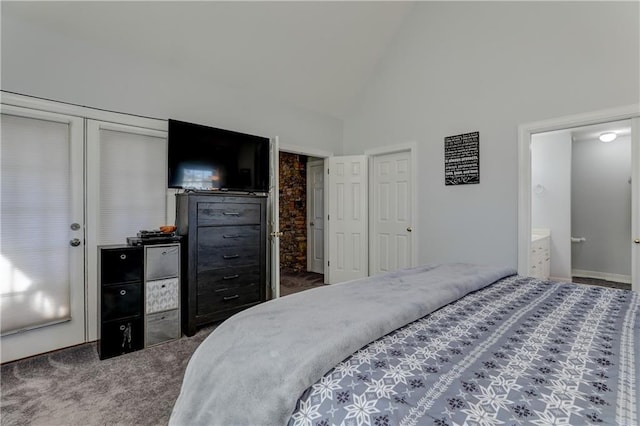 bedroom featuring carpet floors and high vaulted ceiling