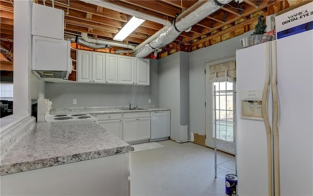 kitchen featuring white cabinets, white appliances, and sink