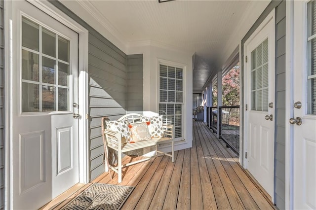 wooden terrace with covered porch