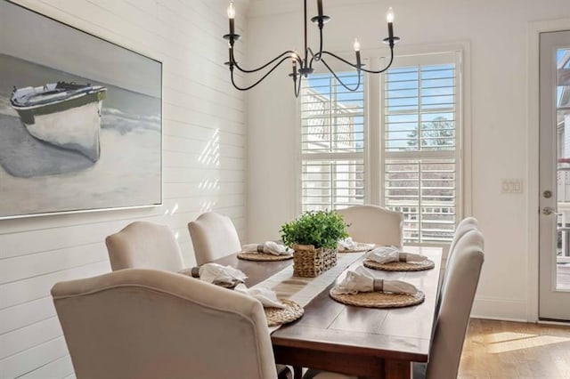 12603 Itaska Walk, Milton, GA 30004 - dining room featuring a chandelier and wood finished floors