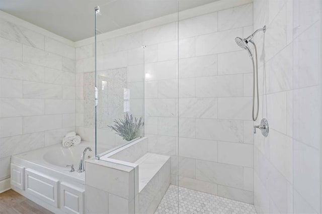12603 Itaska Walk, Milton, GA 30004 - bathroom with a garden tub, tiled shower, and wood finished floors