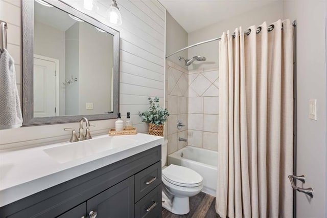12603 Itaska Walk, Milton, GA 30004 - bathroom with vanity, toilet, shower / bath combination with curtain, wood finished floors, and wooden walls