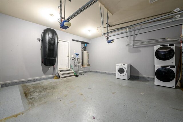 garage featuring a garage door opener, stacked washing maching and dryer, and water heater