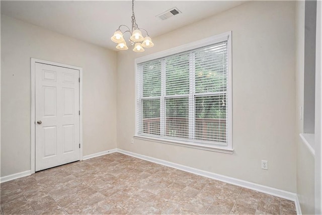 157 Spur Ln, Hiram, GA 30141 - empty room with a chandelier and baseboards